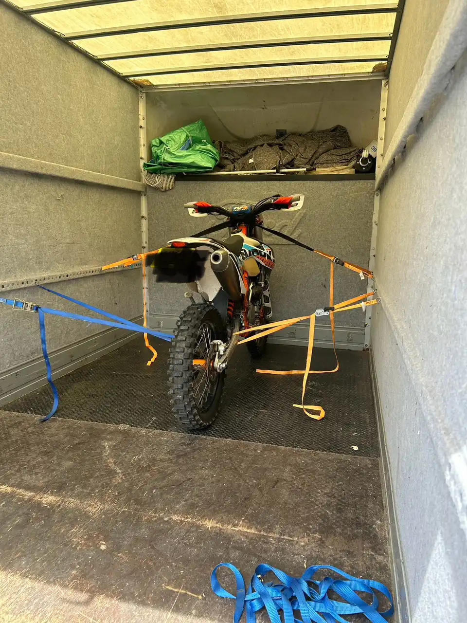 Motorbike securely strapped inside SDS Man and Van removal truck for safe transport in Plymouth Devon